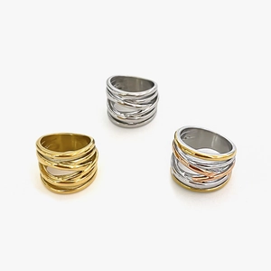 Polished stainless steel intertwined wide rings in gold, silver, and tricolor finishes