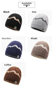 Detail display of five color options for thick knitted beanies with mountain patch