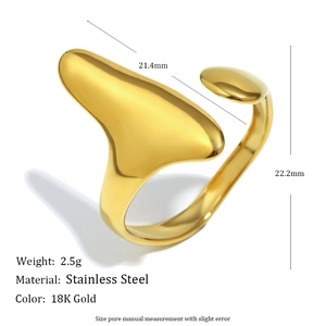 Macro shot showing 18K gold plated stainless steel ring with fluid irregular geometry