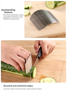 Detail of stainless steel finger guard showing brushed texture and slicing cucumber safely