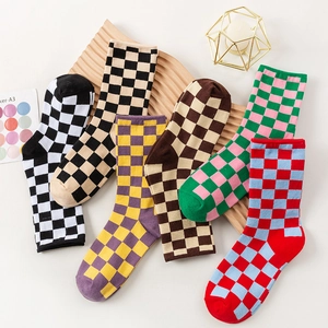 Classic cotton checkerboard crew socks in six assorted colors displayed on a wooden tray