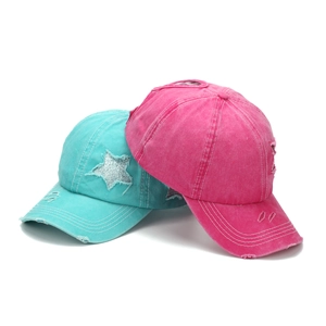 Washed vintage baseball caps in lake blue and pink with sequined star and worn-out brim