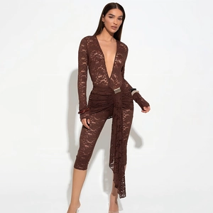 Close-up of brown lace bodysuit featuring a deep V-neck and delicate floral patterns