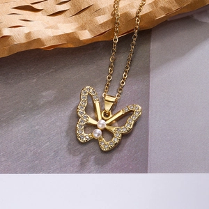 Elegant gold butterfly necklace with cubic zirconia wings and pearl accents for women