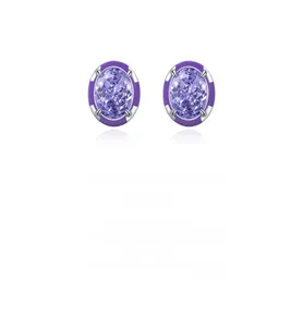 Detail of oval purple gemstone earrings with enamel halo and silver prong setting