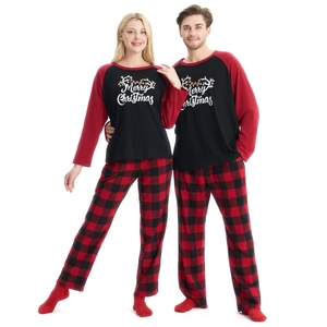 Matching Christmas pajama set with Merry Christmas print and buffalo plaid pants