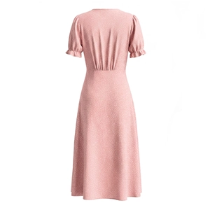 Pink polka dot French style midi dress with puff sleeves on a white mannequin