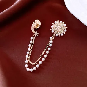 Elegant 14K gold plated Saturn chain brooch with crystal star and pearl moon