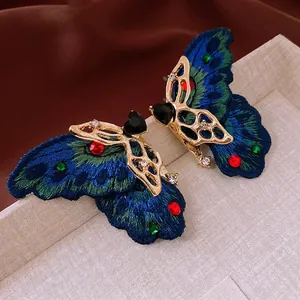 Elegant embroidery butterfly earrings with crystals and heart-shaped black stone