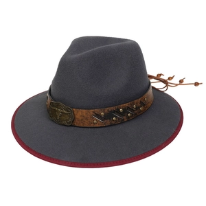 Detail of grey western fedora with brown leather band and bull head metal buckle accessory