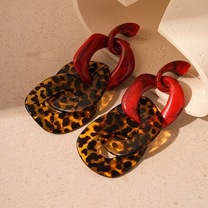 Chunky acrylic leopard print and red geometric chain earrings with a retro bold design