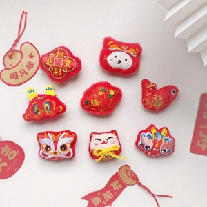 Detailed set of Chinese New Year plush embroidery patches featuring lion dance and lucky cat