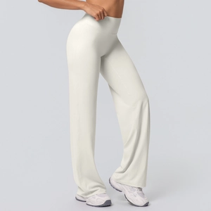 Detail view of high-waisted off-white yoga flare pants with soft brushed fabric finish