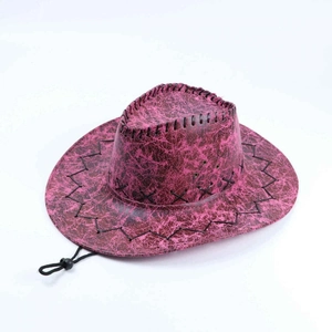 Close-up of pink and black cracked leather cowboy hat with stitched cross details
