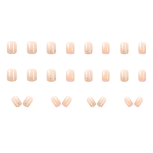 French glitter press-on nails with nude pink base and shimmer gradient detail