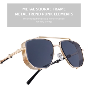 Detail of retro steampunk sunglasses with gold metal square frames and mesh side shields
