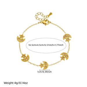 Bracelet en acier doré avec breloques étoile et lune serties de cristaux et dimensions
