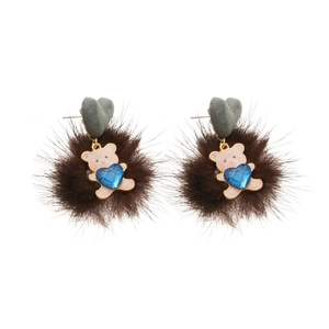 Chic resin bear earrings with brown pom-pom and heart gem on a clean white background