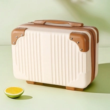 Detail of a 14-inch beige mini suitcase with brown protective corners and vertical texture