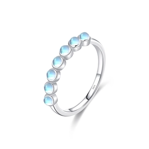 Elegant S925 sterling silver band ring with seven round moonstones in a side view