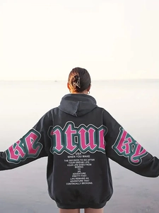 Detail of Kentucky letter print on the back of a black oversized hoodies for women