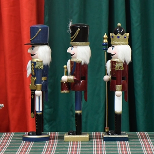 Set of three classic 38cm pearlescent pink and red wooden nutcracker Christmas ornaments