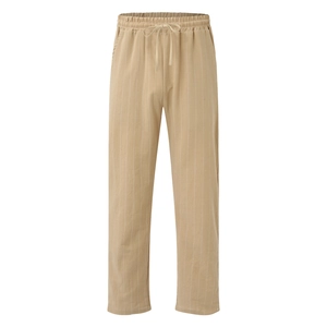 Détail du pantalon en coton et lin à rayures kaki avec taille élastique à cordon