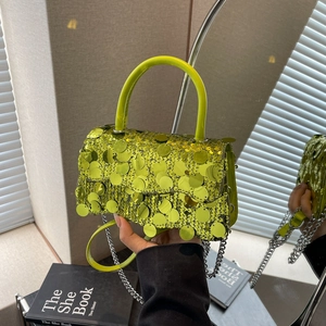 Sparkly neon green sequin crossbody bag with silver chain strap and top handle