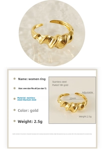 Detail showing irregular 18K gold plated stainless steel wave ring with water reflection