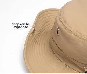 Detail of outdoor sun hat showing the metal buckle feature and waterproof nylon fabric