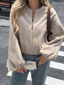 Women's chic beige short fleece jacket with lantern sleeves and front zipper closure