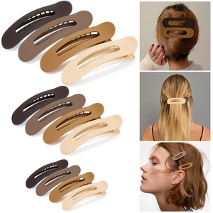 Set de 12 pinzas de pelo mate en varios tonos tierra y tamaños para el peinado