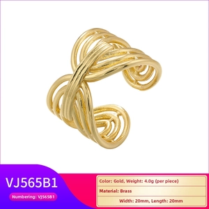 Detailed view of irregular fluid gold ring with dimensions and brass material info