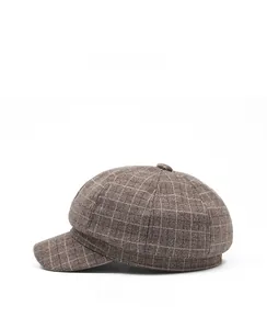Side view of dark coffee checkered newsboy cap with classic eight-panel design and brim