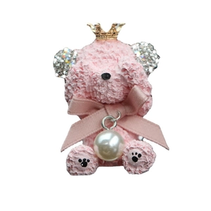 Pink rhinestone teddy bear car air vent clip accessory with crown and pearl detail