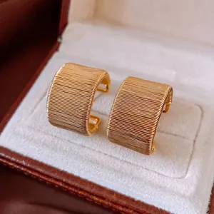 Elegant 18k gold plated C-shaped earrings with fine metal wire wrapping texture