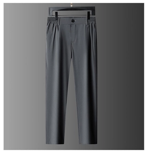 Detailed view of dark grey straight-cut business trousers with premium draped texture