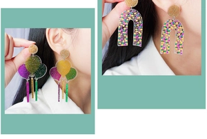 Detail shot of colorful acrylic balloon and arch dangle earrings on a model
