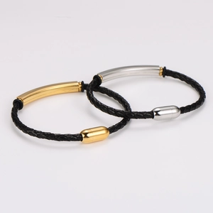 Minimalist black braided leather bracelet set with gold and silver stainless steel clasps