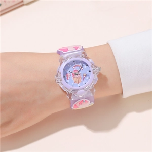 Wrist shot of purple unicorn watch with silicone strap and rainbow dial for kids