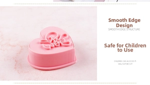 Detail showing pink heart cookie cutter with Love engraving and smooth safety edges