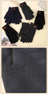 Detail of knitted touchscreen gloves showing rib cuffs and orange brand label