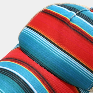 Close-up of colorful Serape striped canvas fabric on a baseball cap with neat stitching