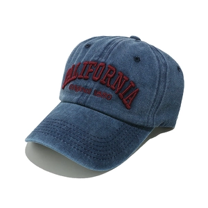 Detailed embroidery of CALIFORNIA text on vintage washed denim baseball cap