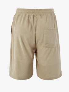 Detail of khaki waffle texture knit shorts with drawstring waist and back pocket