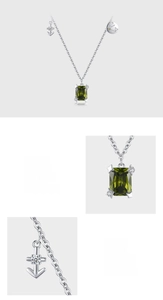 Macro detail of S925 sterling silver Sagittarius necklace with 5A green zircon pendant