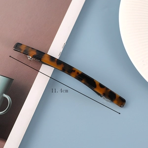 Detailed view of tortoiseshell acetate hair barrette spring clip showing texture and size 11.4cm