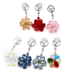 Floral crystal beaded keychains in multiple vibrant colors with silver metal rings