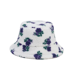 White floral sherpa bucket hat with purple flower pattern for winter sun protection