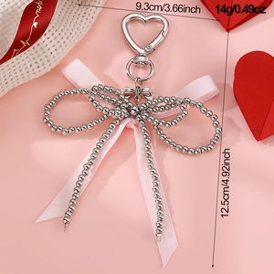Detail showing dimensions of silver beaded heart keychain with pink ribbon bow